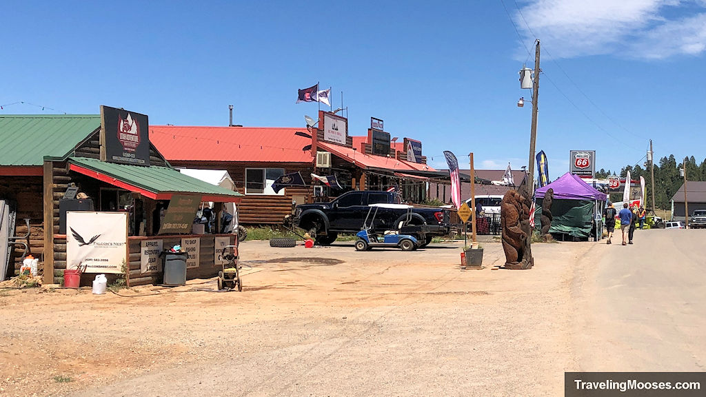 A small town along phillips route 66 with pedestrians walking around
